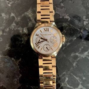 MK gold watch